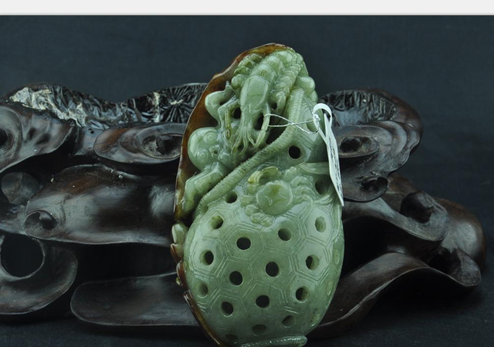 翡翠透雕的艺术——渔获图的寓意与工艺之美